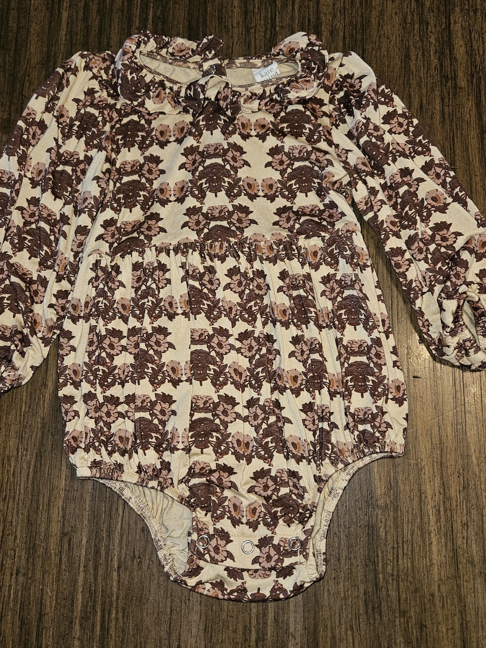 kate quinn cream and brown floral long-sleeve romper with ruffle collar